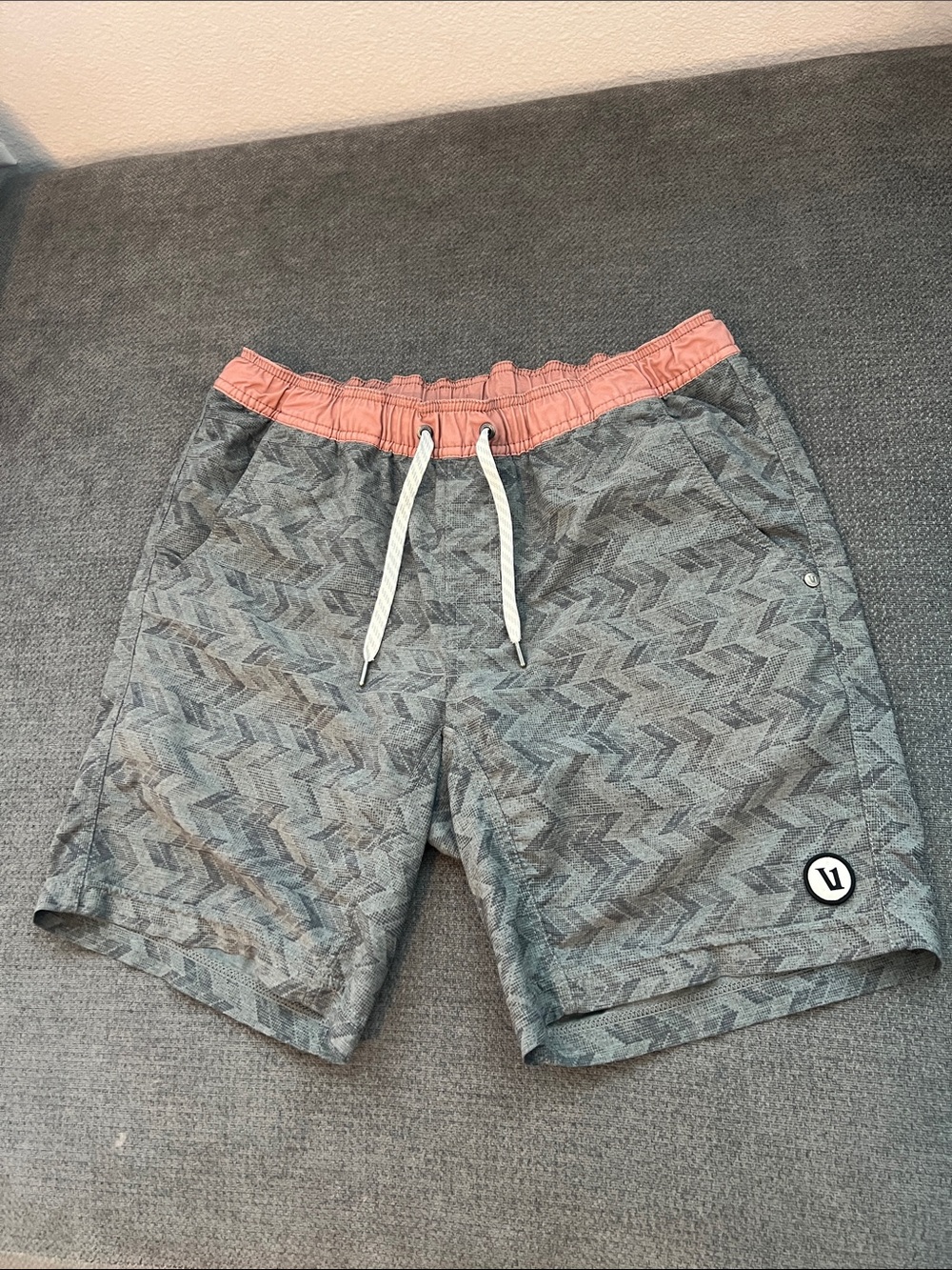 Vuori Men's Grey Chevron Athletic Shorts with orange Waistband